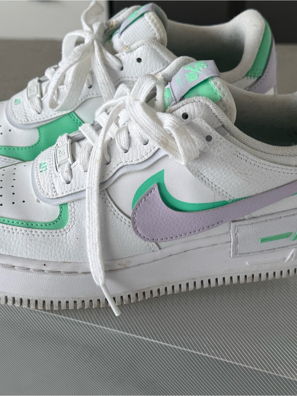 Nike White Sneakers with Mint Green & Lavender Swoosh